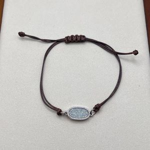 Handmade bracelet brown with a pearl like centre